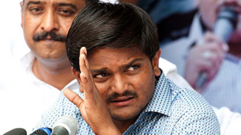 Congress gave three options to the Hardik Patel-led Patidar Anamat Andolan Samiti (PAAS) at a late night meeting at Ahmedabad with respect to latters quota demand for its community. (Photo: File | PTI)