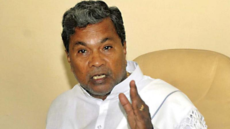 PM Modiâ€™s friends looted & scooted: Siddaramaiah