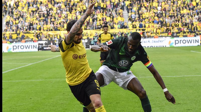 Bundesliga: Paco Alcacer\s double strike gives Dortmund 2-0 win over Wolsburg