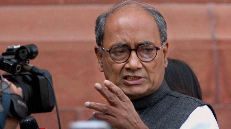 Posters calling for ban on Digvijaya\s entry into temples appear in Bhopal