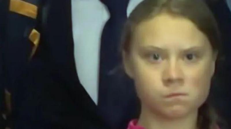 Watch: Climate activist Greta Thunberg\s frown as Trump passes her