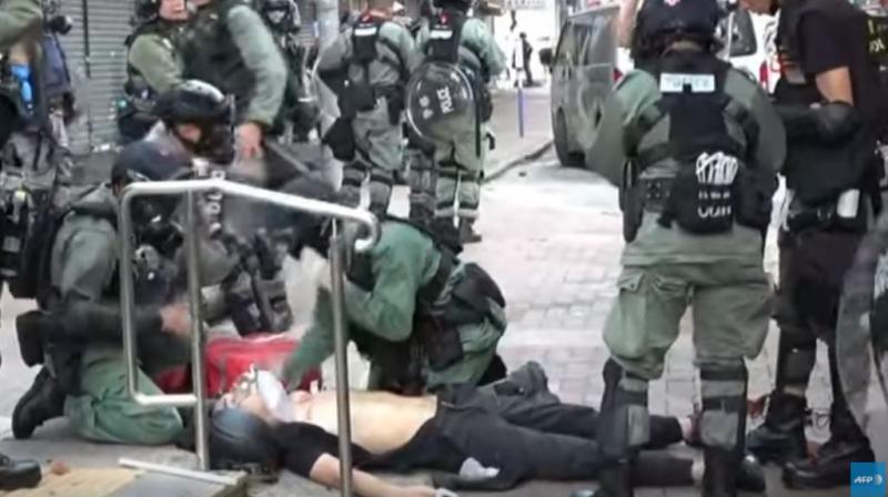 Watch: Protester shot by Hong Kong police as China celebrates 70th birthday