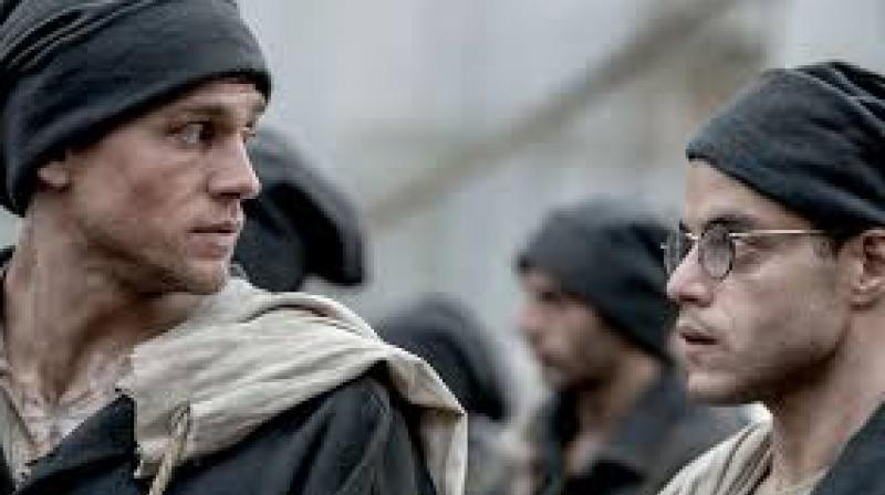 Charles Hunnam and Rami Malek in the still from Papillon.
