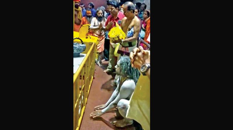 A nude Naga sadhu, accompanied by three semi-clad followers who visited the Lord Venkateswara temple at the Tirumala Tirupati Devasthanams (TTD) Information Centre at T. Nagar in the city created a flutter (Photo: DC)