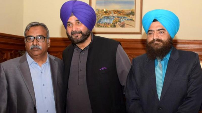 Chawla posted the snap on his Facebook page, where he is seen standing next to Sidhu during the latters visit to Pakistan for the ground-breaking ceremony of the Kartarpur corridor. (Photo: ANI)