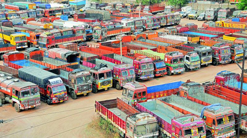 Trucks parked at Vanasthalipuram during the strike which began on Sunday.