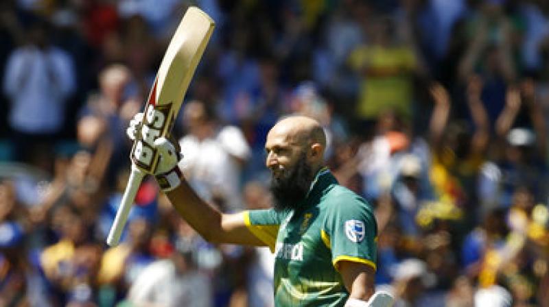 Hashim Amla hit five fours and two sixes in his 103 off 115 deliveries before being run out. He added 145 runs for the second wicket with Faf du Plessis (75).(Photo: AP)