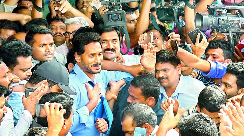YSRC chief Y.S. Jagan Mohan Reddy meets his  followers after getting discharged from a private hospital in Banjara Hills on Friday. (Photo:Gandhi)