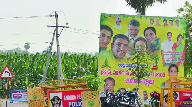Hoardings and flexis installed in front of the Chief Ministers house near Vijayawada on Saturday. (Photo: DC)