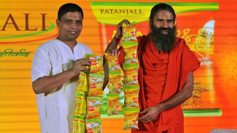 Acharya Balkrishna, the head of yoga expert Baba Ramdev-run FMCG company Patanjali is one Huruns list of richest Indians. Photo: PTI