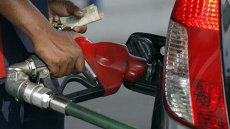 The Uttarakhand government on Wednesday slashed cess and VAT on petrol and fuel by 2 per cent each. Photo: PTI
