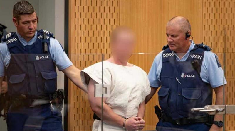 Brenton Terrant impassive as he is charged in court for mosque shooting