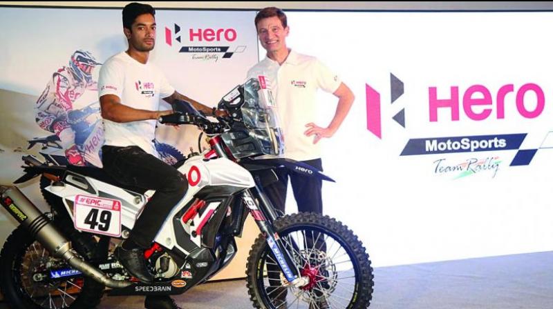 C.S. Santosh (left) at the unveiling of Team Hero Motorsports RR 450 bike in New Delhi.