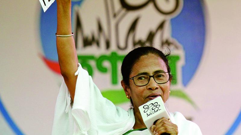 Trinamul Congress leader and West Bengal CM Mamata Banerjee at an election rally at Anchana, about 60 kilometres south of Kolkata, on Thursday.  (AP)