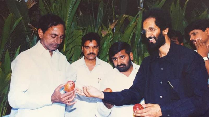 Telangana CM K. Chandrasekhar Rao looks at a Sora variety mango at a nursery in  Sangareddy.