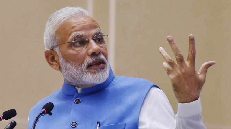 Modi also stated that India and UK share an enduring partnership nurtured by \extensive people to people linkages lets not forget cricket here\. (Photo: PTI)
