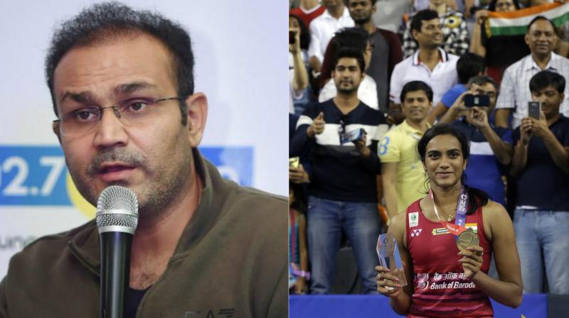 After Sindhus victory in Korea, former India batsman Virender Sehwag was quick to congratulate the Indian shuttler on her impressive victory in the final. (Photo: PTI/AP)