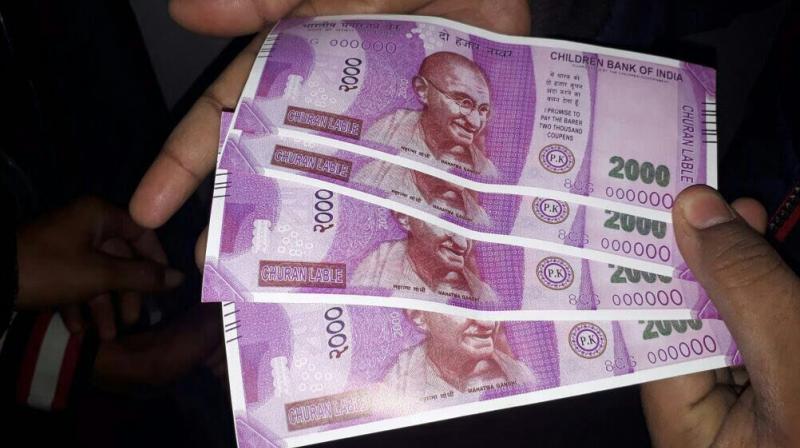 Fake notes of Rs 2000 which were dispensed by an SBI ATM in south Delhi on Wednesday. (Photo: PTI)