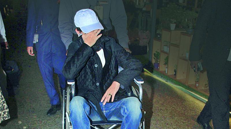 Irrfan Khan in a wheelchair