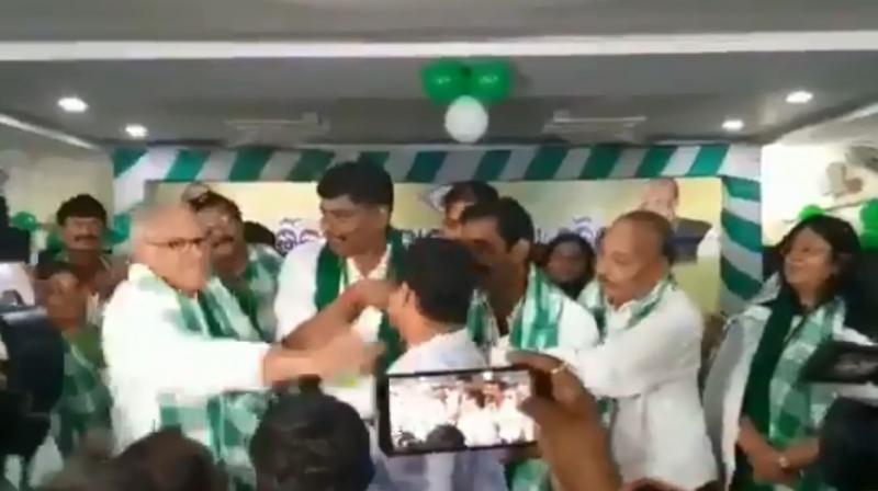 Chandrasekhar Sahu slapped Sangram Sahu, former Gajapati District Youth Congress president, who had attended the meeting to join the ruling BJD. (Photo: video screengrab)