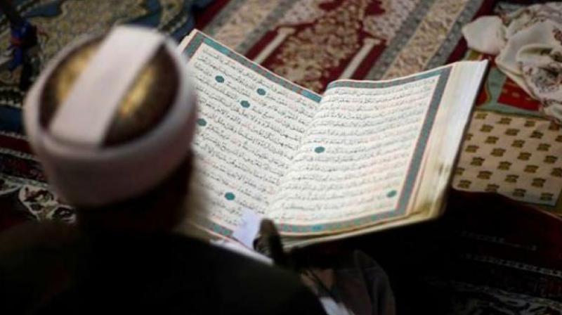 A person reading the Holy Quran