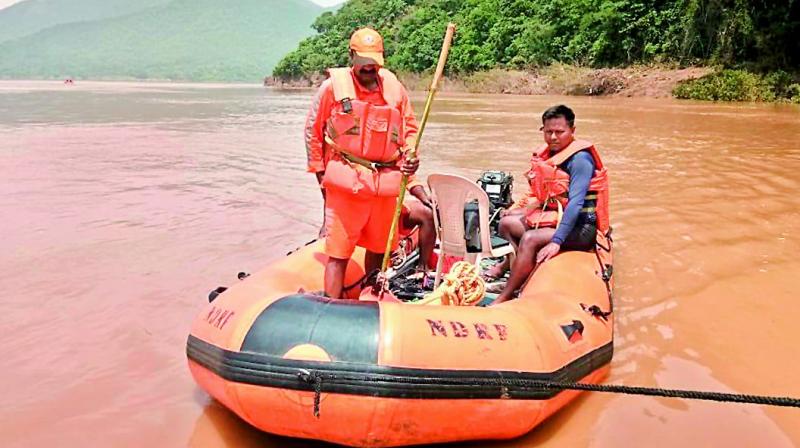 NDRF teams continue with their operations as they kept searching for missing persons at Devipatnam mandal in East Godavari on Tuesday. (Photo: DC)