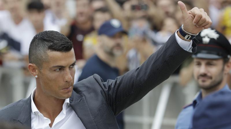 CR7â€™s love for kids knows no limit as he halts bus to click picture with sick child