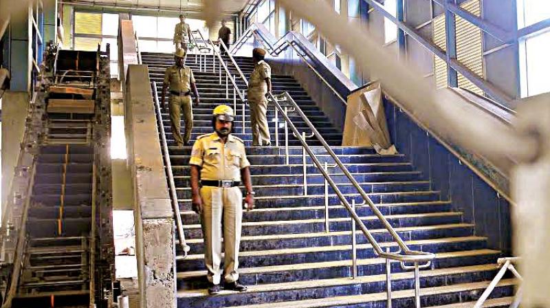 Policemen were stationed round-the-clock at Lalbagh Metro station following a bomb scare 	 DC