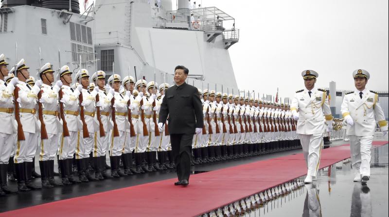 Xi Jinping shows off new missile destroyers in China\s naval parade