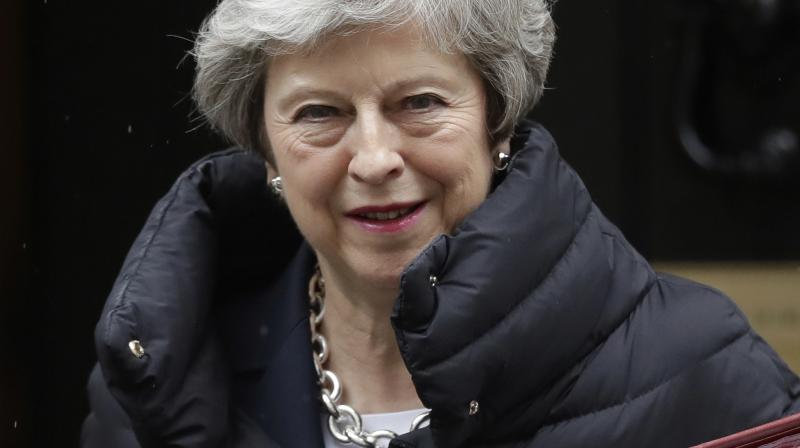 Theresa May should set resignation date next week: Senior lawmaker