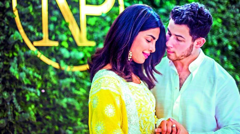 Priyanka and Nick dance the night away in Vegas and spend time in infinity pool