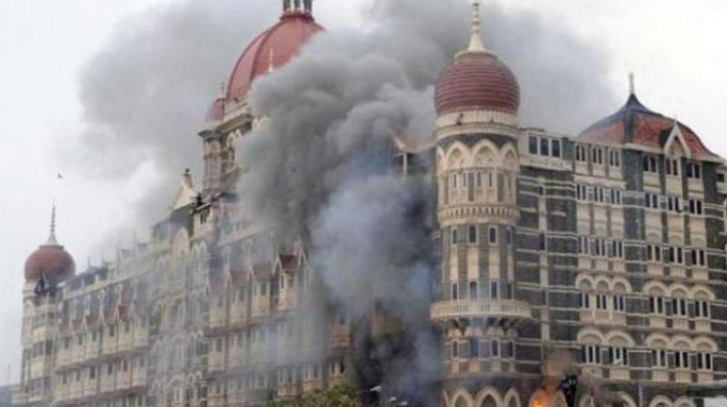 File photo of the November 26, 2008 Mumbai terror attacks outside Taj. (Photo: PTI)