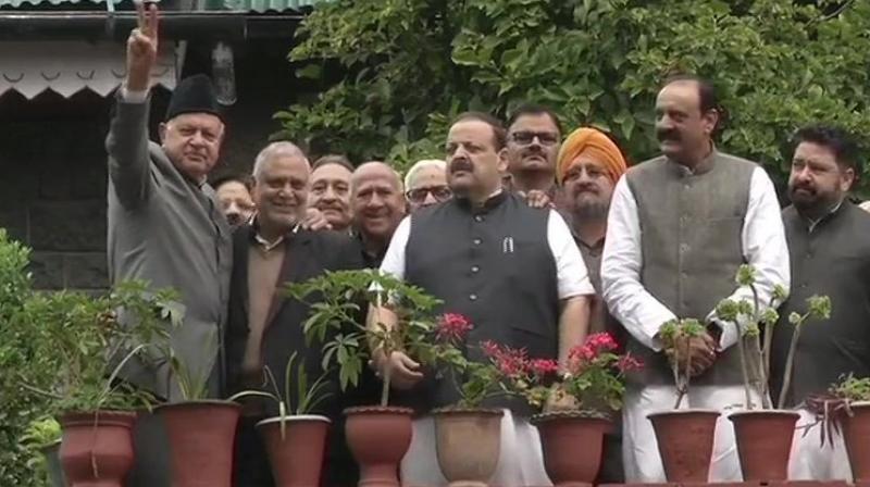 NC delegation meets Farooq, Omar Abdullah in Srinagar