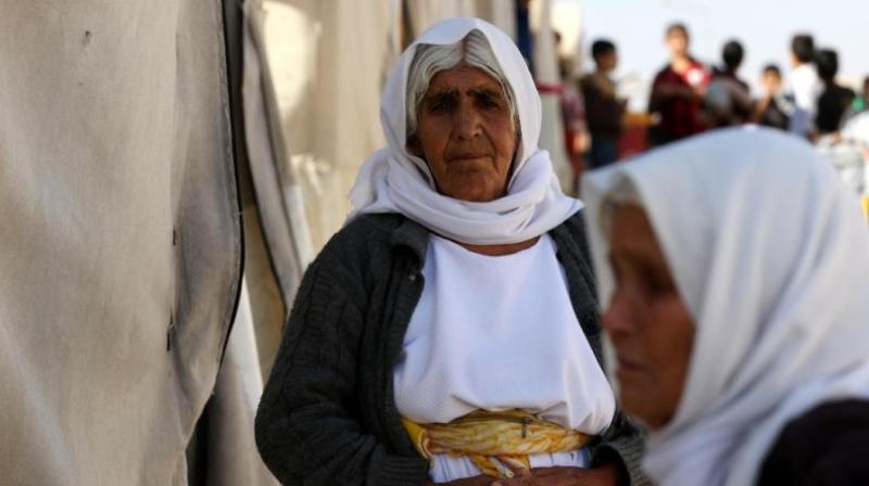 Yezidis are a Kurdish-speaking minority with a pre-Islamic religion thought partly to have its origin in the Zoroastrianism of ancient Persia. They are neither Arab nor Muslim and IS considers them polytheistic heretics. (Photo: AFP)