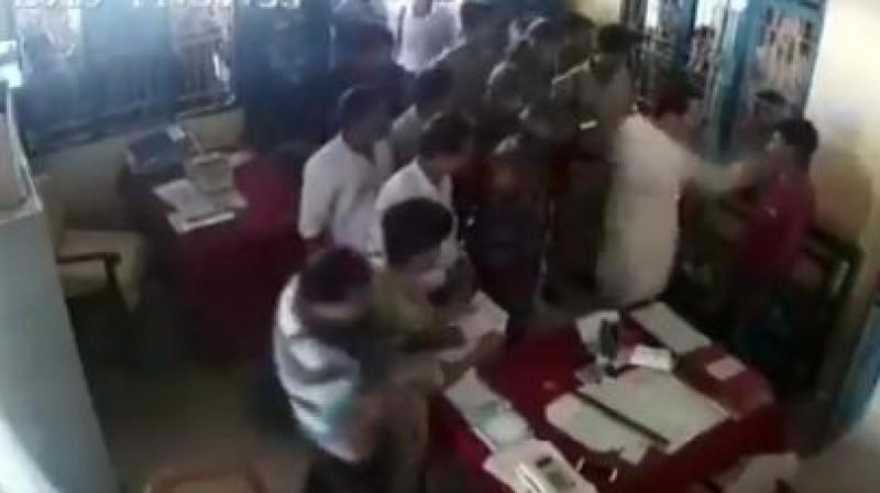 Watch: Tripura Cong chief booked for slapping man in police station
