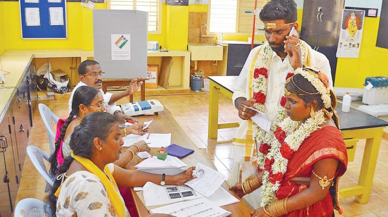 Newlyweds Siva and Yuvarani landed at the polling station at Vidya Mandir in Mylapore to cast their votes almost immediately after tying the knot. (Photo: N. Sampath)