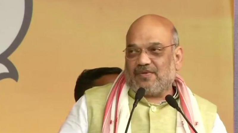 Amit Shah asks Rahul to clear stand on Omar Abdullah\s demand for separate PM