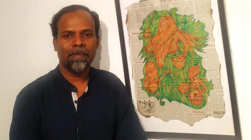 Artist Subhash Thodayam paints on newspapers collected from random areas