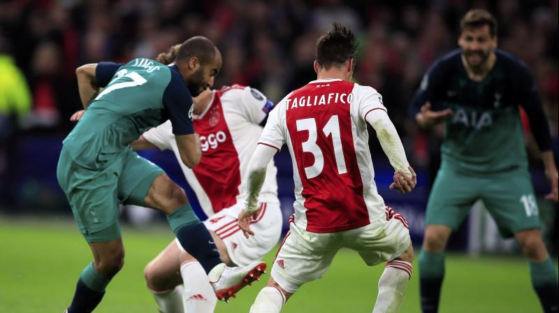Ajax skipper Matthijs de Ligts fifth-minute header and a superb 35th minute effort by Hakim Ziyech put Ajax 3-0 ahead on aggregate by halftime at a raucous Johan Cruyff Arena.