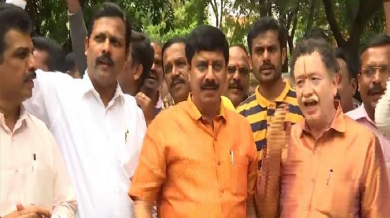 Karnataka: BJP workers celebrate outside Yeddyurappa\s residence
