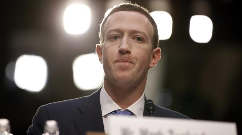 Facebook CEO Mark Zuckerberg testifies before a joint hearing of the Commerce and Judiciary Committees on Capitol Hill in Washington, Tuesday, April 10, 2018, about the use of Facebook data to target American voters in the 2016 election. (AP Photo/Alex Brandon)