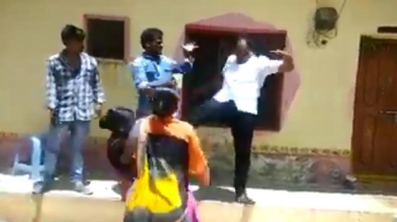 A video of the incident shows Immadi Gopi kicking the woman in full public view. (Photo: YouTube | Screengrab)