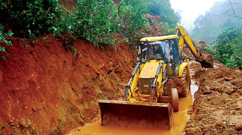 Traffic on Madikeri-Mangaluru road was affected because of landslides on Monday 	 KPN