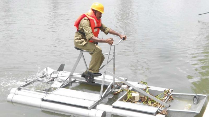 n It consists of a floating platform with a scooper, which can be propelled over the water surface to collect floating garbage.
