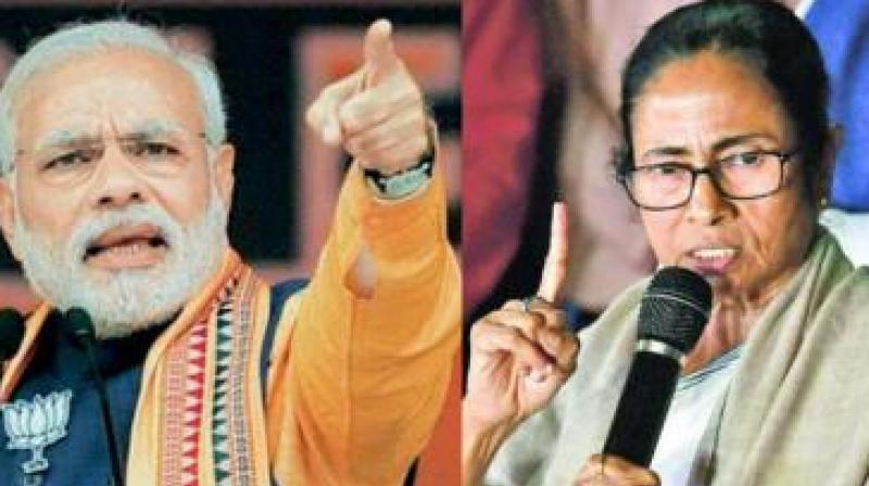 Won\t file FIR against you even if you paint an ugly picture of me: PM to Mamata