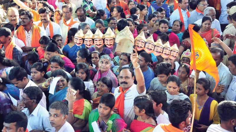 Members of Vishwa Hindu Parishad take out a rally demanding early construction of Ram temple in Ayodhya, in Bengaluru. (Photo: KPN)