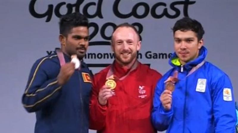 Deepak Lather lifted 136kgs in snatch and 159 kgs in clean and jerk to finish third in the standings. (Photo: Twitter / IOA)