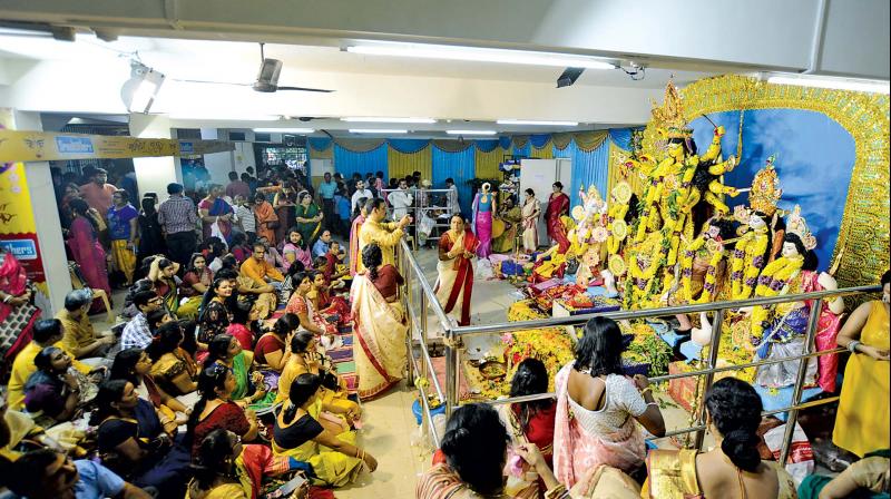 Devotees worshipping the goddess Durga on Ashtami at the Bengal Association in T Nagar. (Photo: DC)