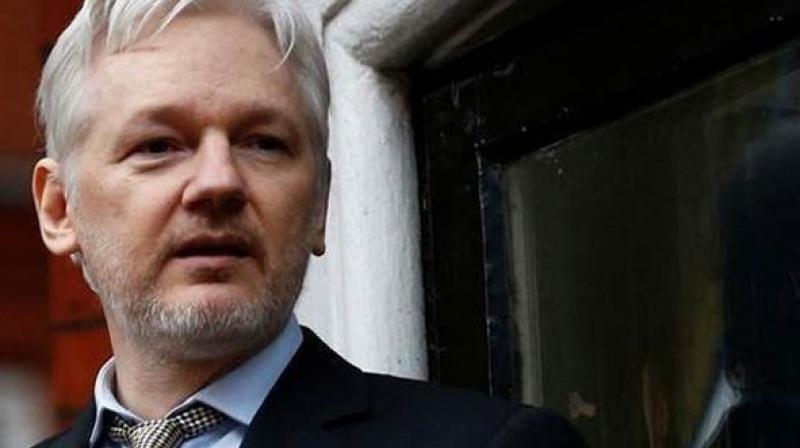 Assange suffering psychological torture, would face \show trial\ in US