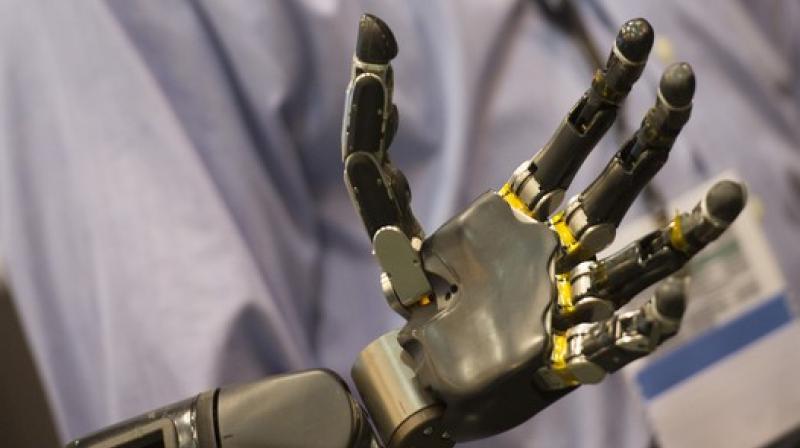 Researcher develops mind-controlled robotic arm